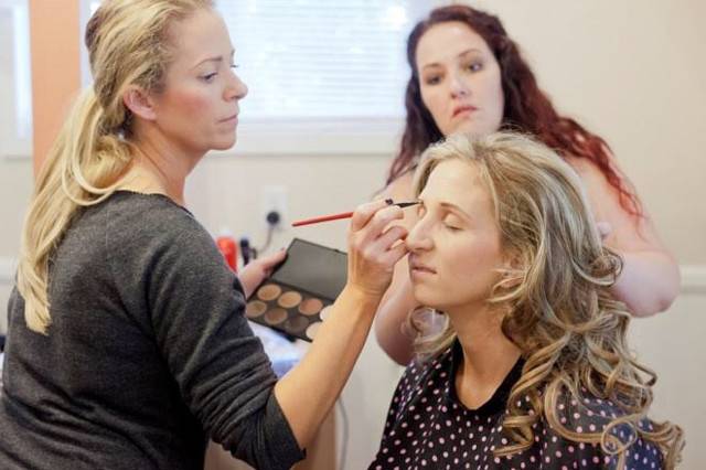 Bride getting her makeup done