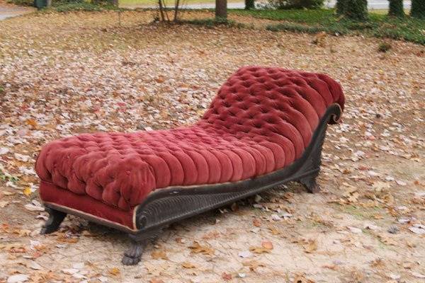 Red velvet chaise, great for rustic wedding