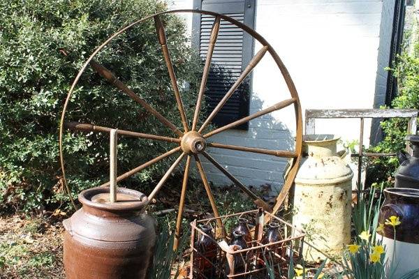 wood spinning wheel, milk jugs, windows and more for rustic decor