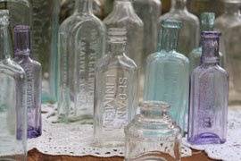 Antique bottles are great accent pieces or vases for wedding reception tables