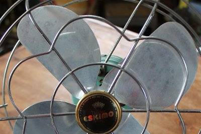 Vintage teal electric fan