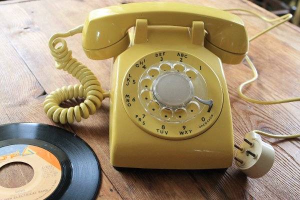 Yellow Rotary Phone perfect for retro wedding