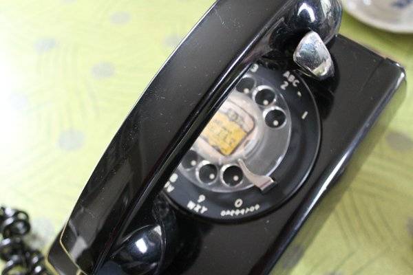 Black wall rotary phone