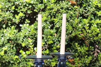 Large blue glass candlesticks are just two of the many candlesticks we have, milk glass, silver, crystal, wood
