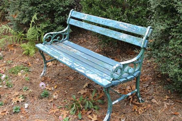 chippy blue park bench, perfect for photo shoots and next to dance floor