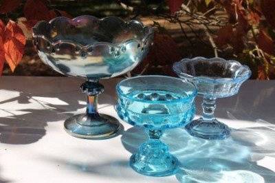 Glassware in teals and blues for centerpieces and dessert tables