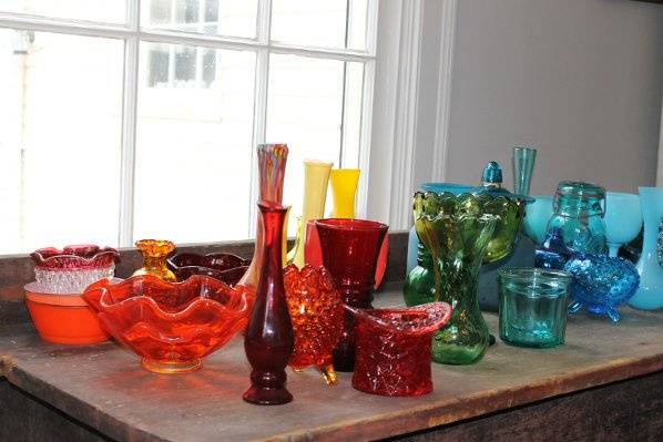 we have glassware in all the colors of the rainbow, no need to dye or paint jars, rent gorgeous colored glass