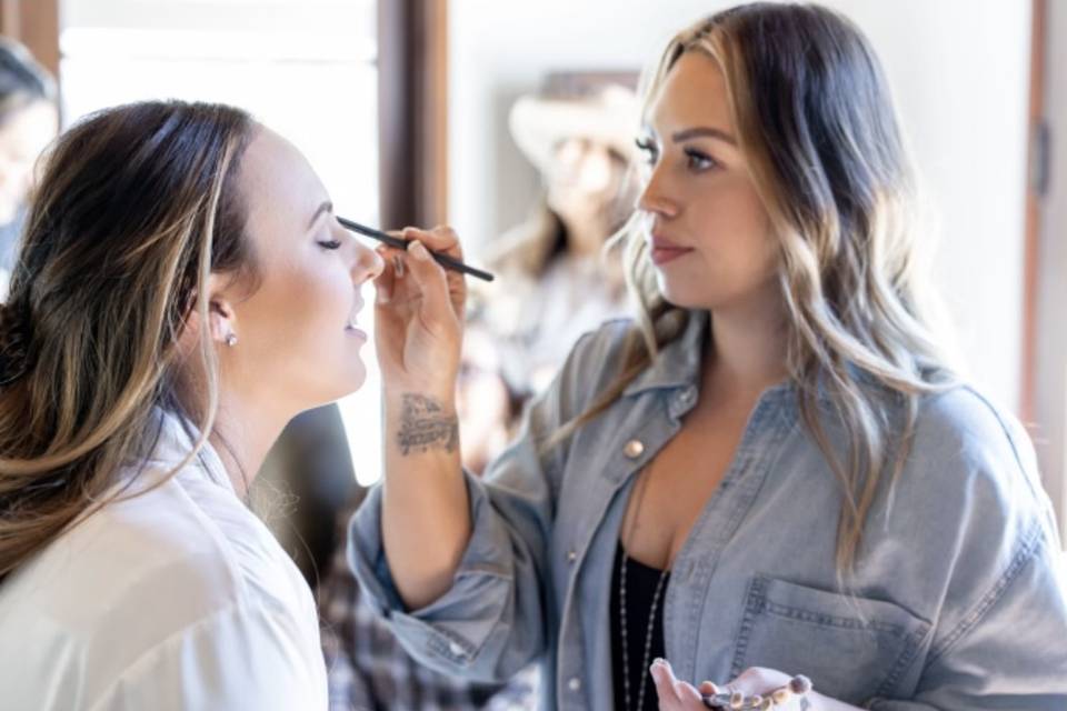 Cheyenne doing Bridal Makeup