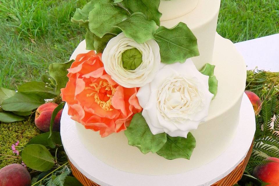 Peach & white wedding cake