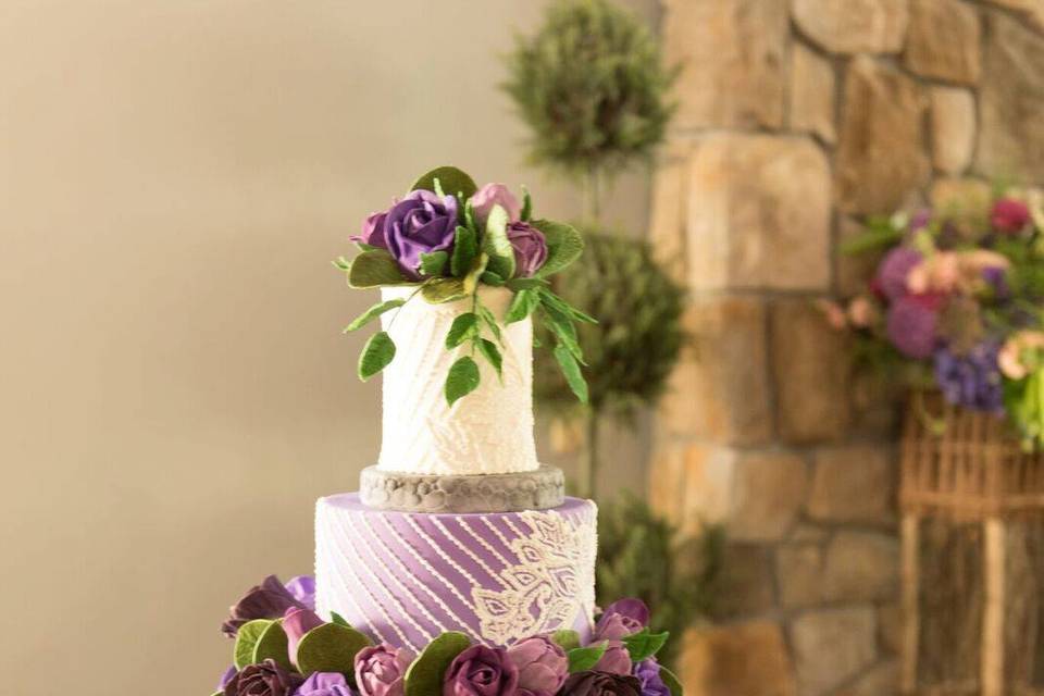 Purple & piping wedding cake