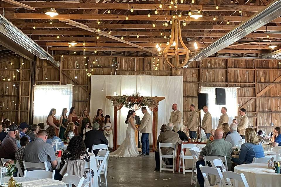 Indoor ceremony in barn