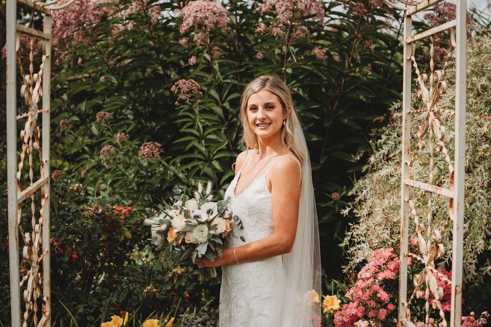Bride with garden arbor