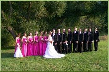 The couple with the bridesmaids and groomsmen