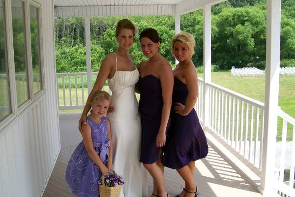 The bride with her bridesmaids and flower girl