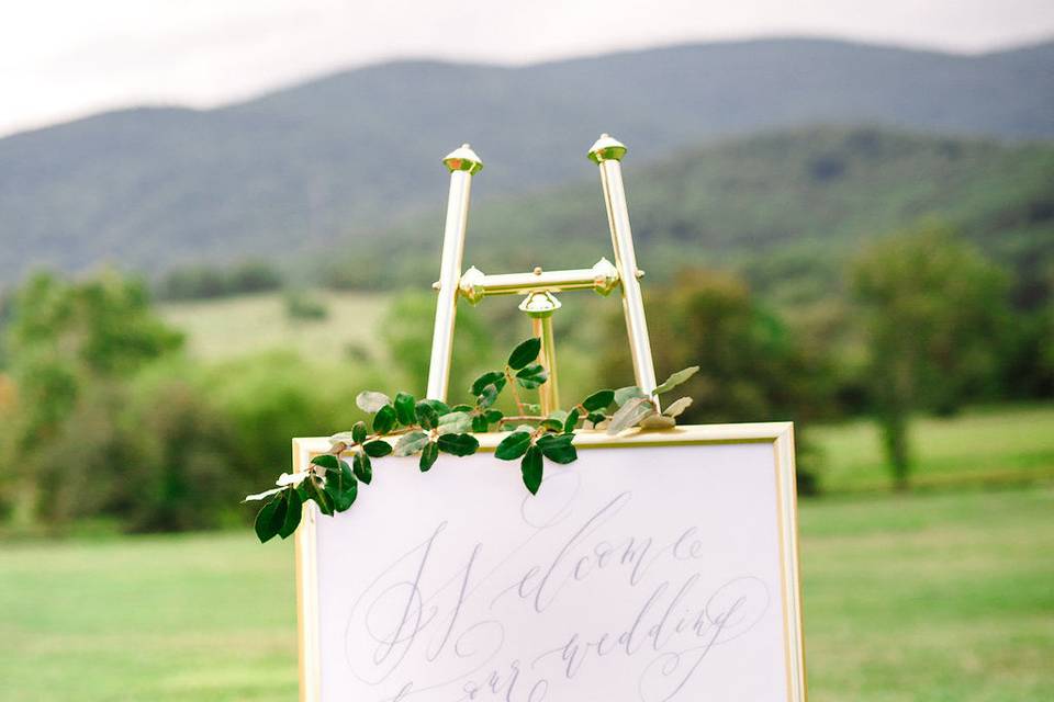 Welcome to our wedding sign: https://www.etsy.com/listing/540760678/flourished-calligraphy-wedding-welcome