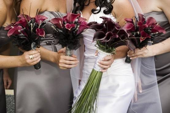 Ladies holding bouquets