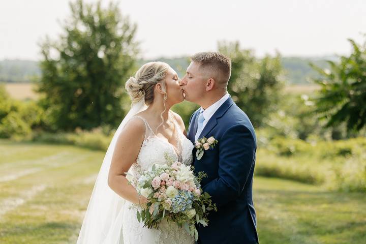 Bride and groom kissing