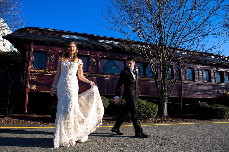 Couple walking away from train