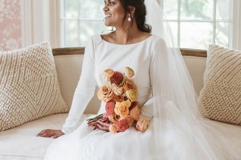 Bride in front of window