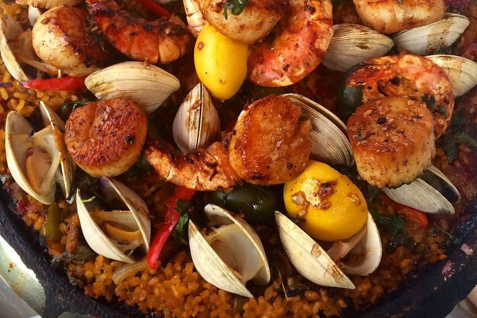 Our seafood paella’s always wow the crowd!  Imagine one of these on every table!