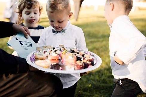 The ring boys attack the bride and groom platter!