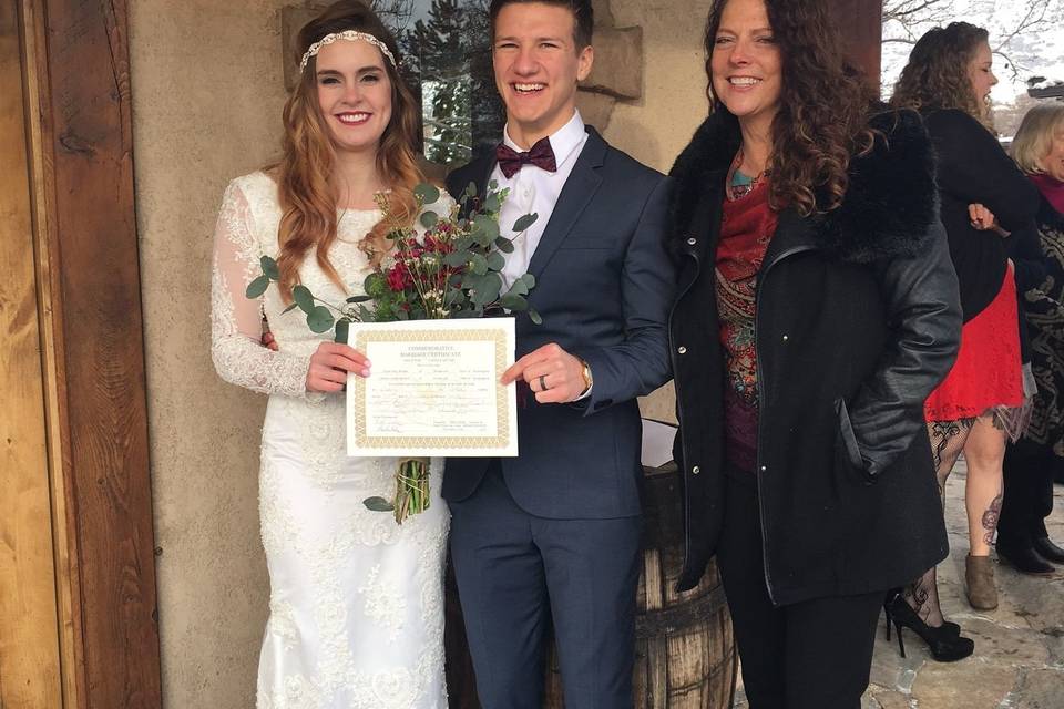 Couple with the officiant