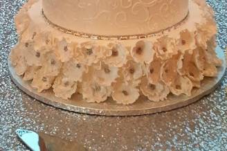 Intricately frosted wedding cake