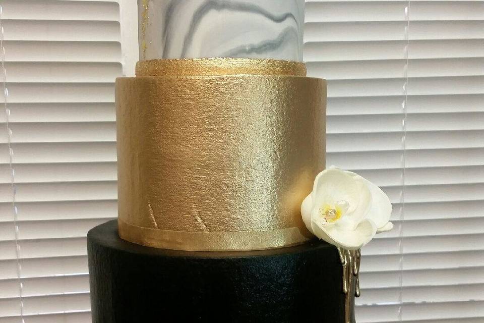 Black, gold, and marble wedding cake