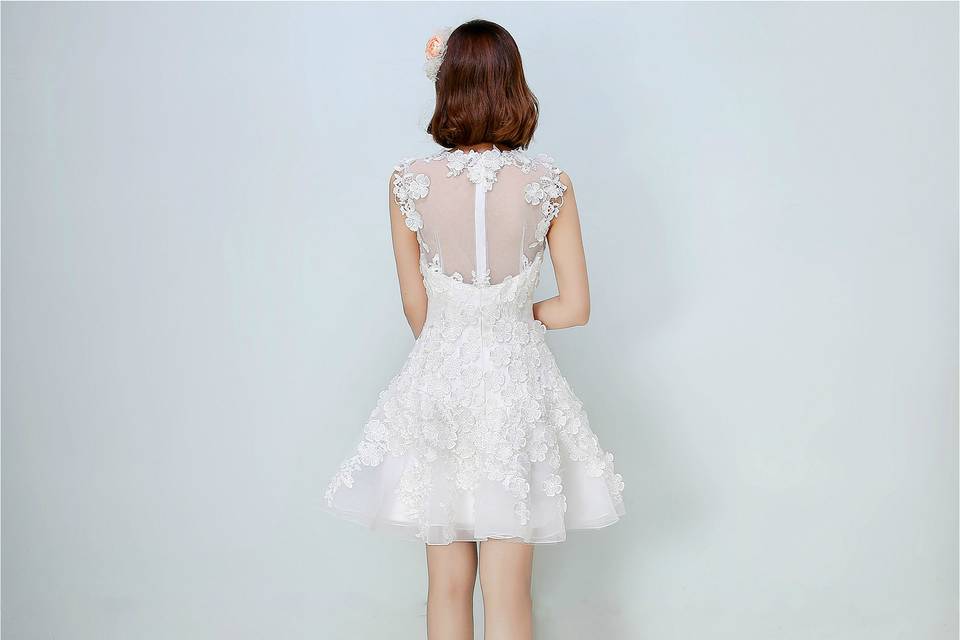 This beaded 3D cherry blossom floral lace dress is a mix of iconic elegance, dreamy romance, chic modernity, and vintage-inspired glamour. Selena Huan evokes a sense of magic through carefully arranged lace appliques and layers of luxe details to channel the little inner princess of our lovely bride.