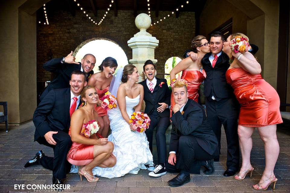 The couple with the bridesmaids and groomsmen