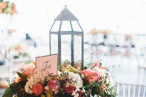 Table numbers placed within flower arrangements