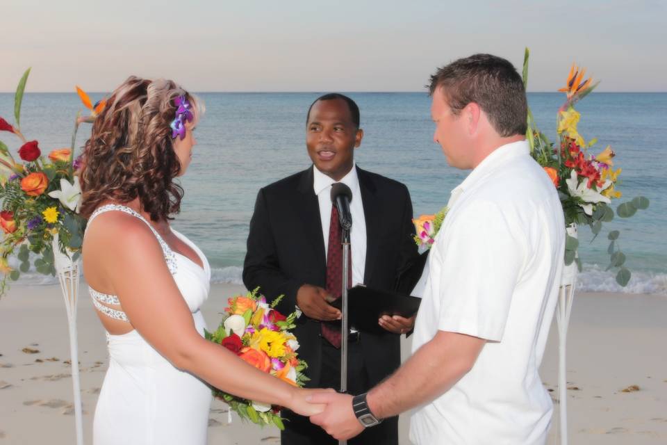 Beach wedding with tikki torch