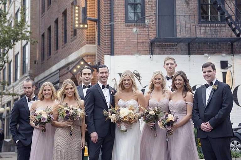 The newlyweds and wedding attendants