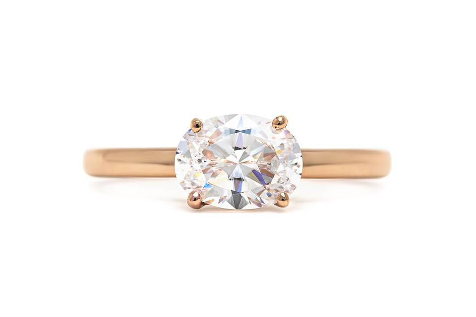 East West oval diamond ring