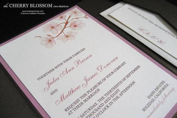 The Cherry Blossom invitation with original cherry blossom artwork by Brenna Catalano Design Studio. This invitation comes with a belly band with names and wedding date. Pocket format and colors can be customized. Also available as a panel invitation.