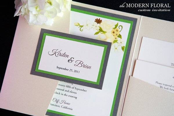 The Modern Floral invitation from Brenna Catalano Design Studio features a hand painted floral motif, double layer backing and pocket to hold insert cards. Comes with front tag with names and date. Colors are customizable.