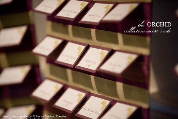 Escort cards with original cymbidium orchid motif by Brenna Catalano Design Studio.