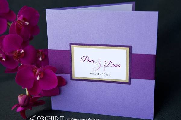 Purple Orchid Wedding Invitation with original painted purple Phalaenopsis Orchid motif by Brenna Catalano Design Studio. Tag on front with names and wedding date. Color and format can be customized.
