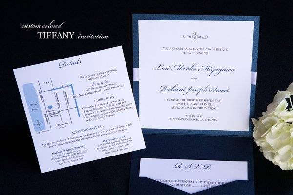 Example of the Tiffany invitation from Brenna Catalano Design Studio custom colored to match wedding colors. Satin ribbon and crystal accent. Map design available.