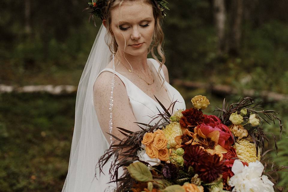 Bride with crown and bouquet