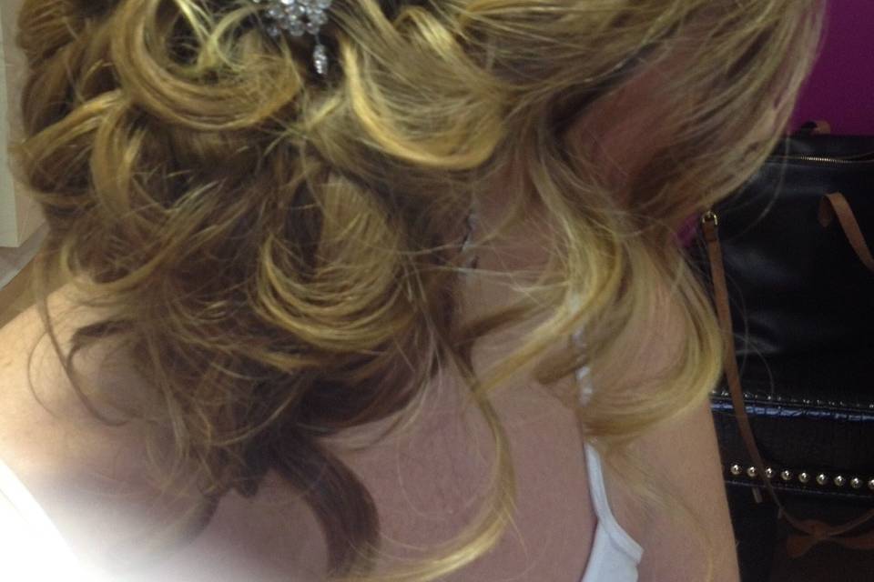 Braids with loosely curled bun to the side,   extensions added for fullness, bridal hair trial at my Sayville location