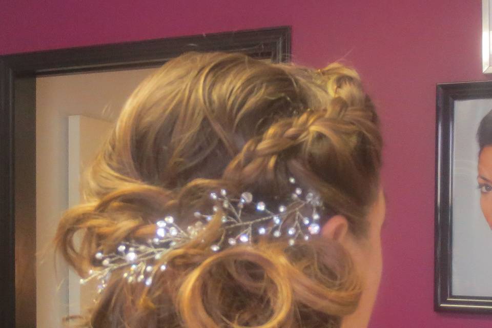 wedding hair, Side braid in-twin in to a bun, hair extension  incorporated into bun.