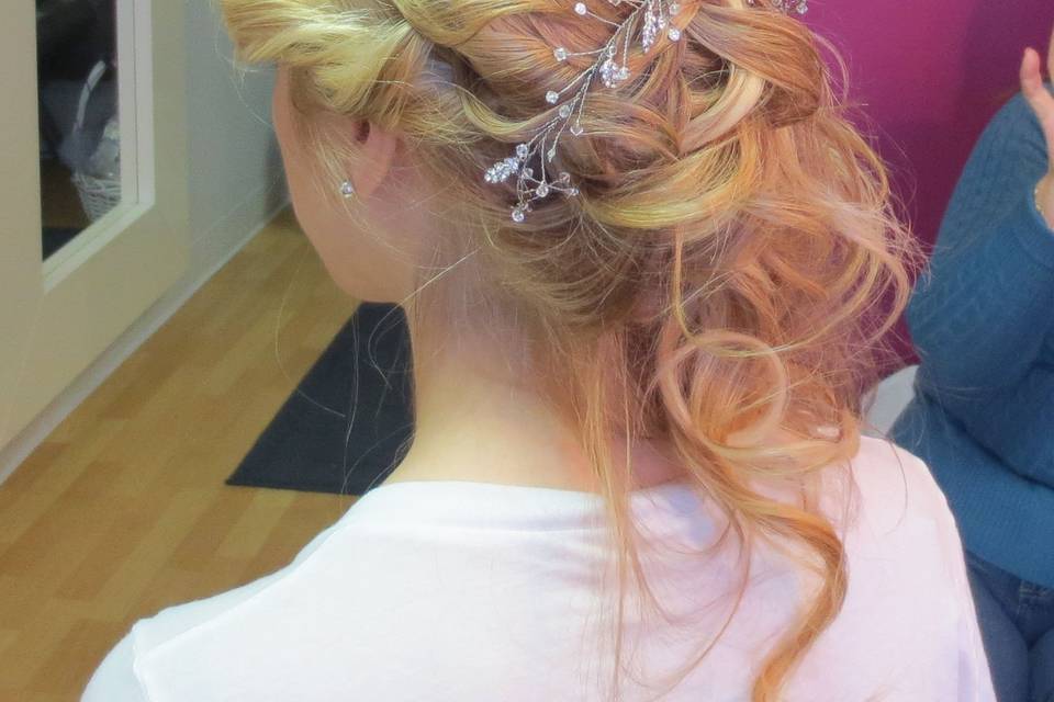 Whimsical, Curled wedding hairstyle, length and fullness by incorporating 100% natural clip-in hair extensions can be worn in an up-do, or down.   Custom made by Roseanna to be color matched perfectly to the bride's hair