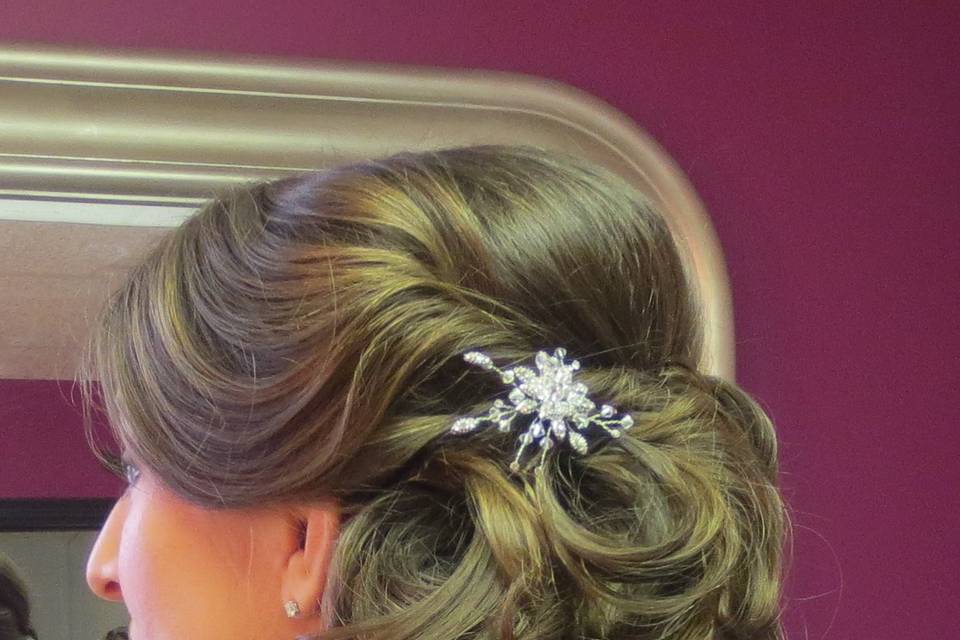 Wedding hairstyle, Breakfast at Tiffany,  incorporating 100% natural clip-in hair extensions can be worn in an up-do, or down.   Custom made by Roseanna to be color matched perfectly to the bride's hair