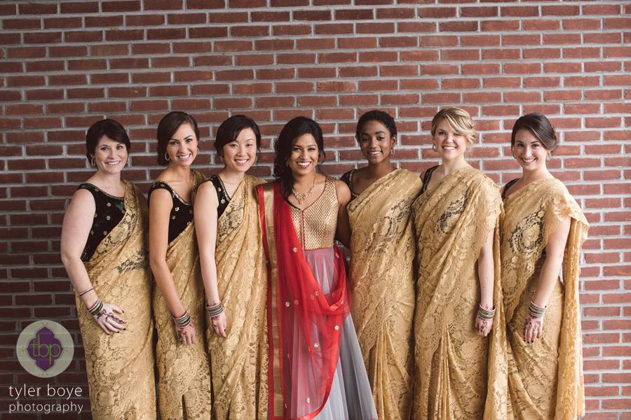 Smiling bride and bridesmaids