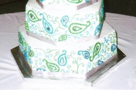 PAISLEY DREAMS:  This 3-tier cake will surprise you with its elegance, beauty, and variety.  Made with hexagon shaped cakes.