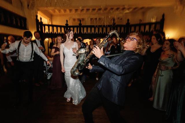 The bride dancing beside the sax during the reception set