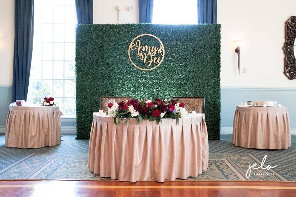 Greenery wall with tables