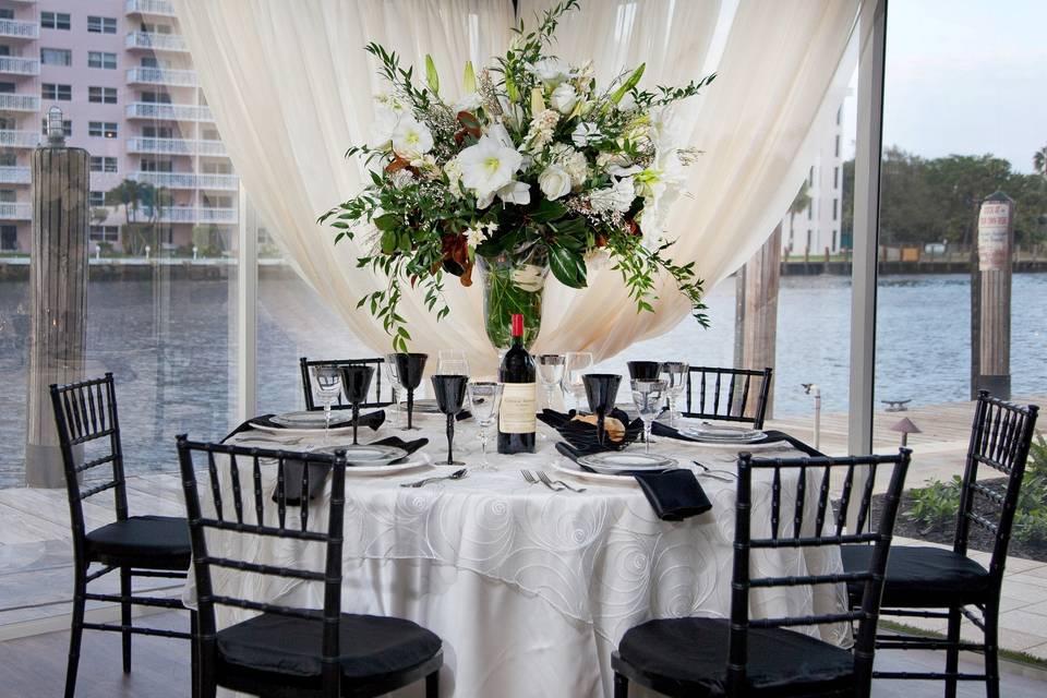 Table setting in black chairs