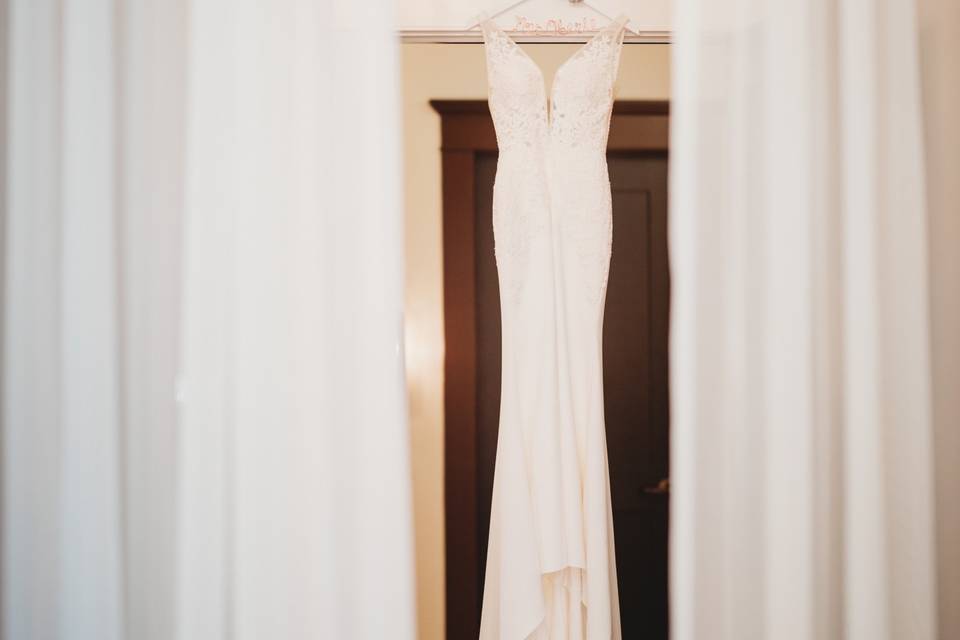 Wedding dress hanging up